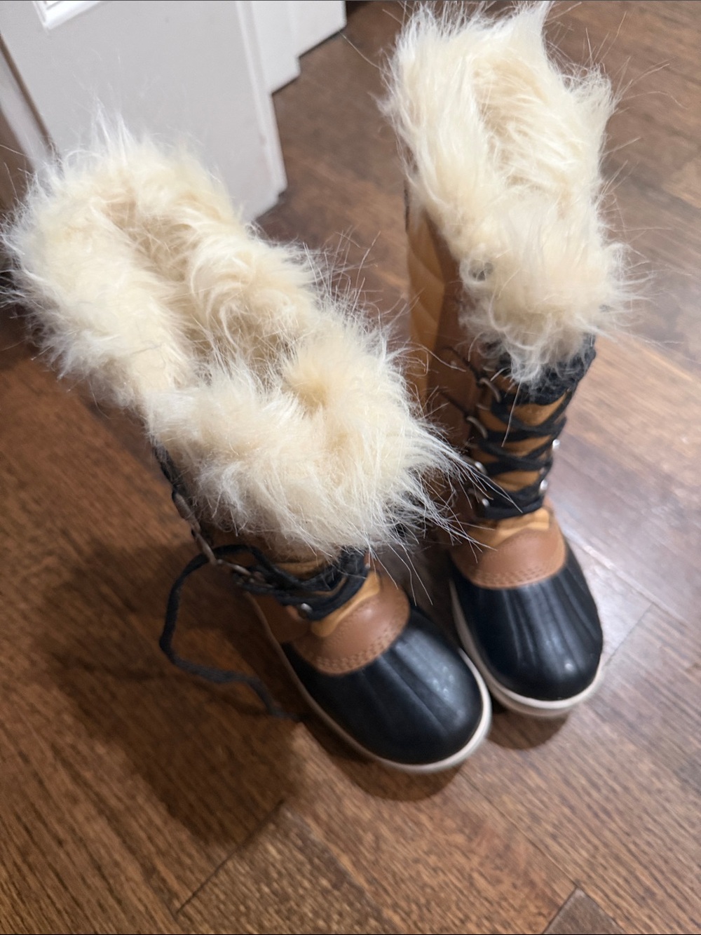 Sorel Kids Lace-Up Winter Boots in Black and Tan with Cream Faux Fur